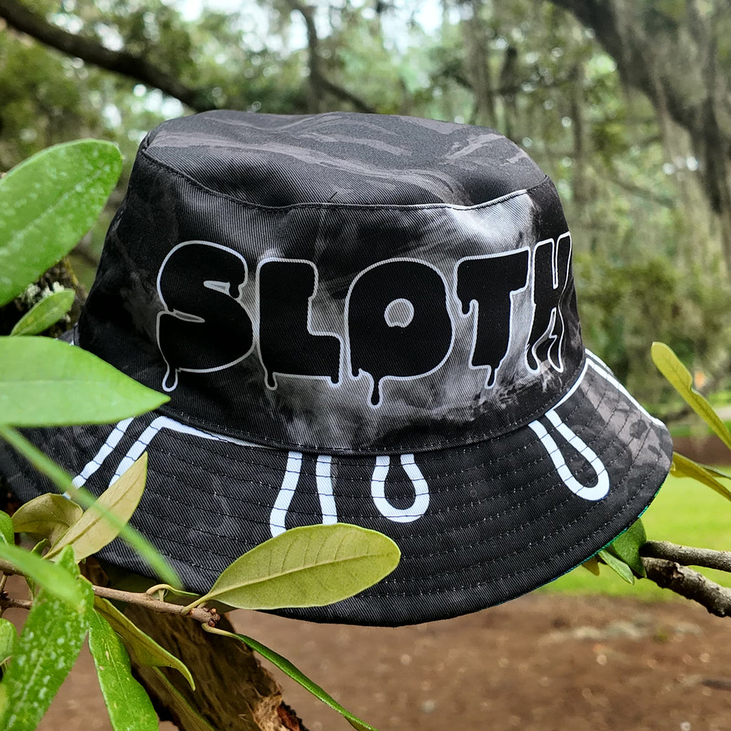 SLOTH reversible bucket hat, drip side: black and gray tie-dye with drippy SLOTH lettering